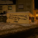 Bild: Die ungeschminkte Wahrheit - Graffiti an einer Mauer in der Nähe des Johannisturmes